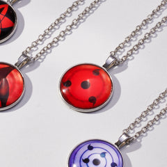 Sharingan (silver) + Kakashi necklace (black)